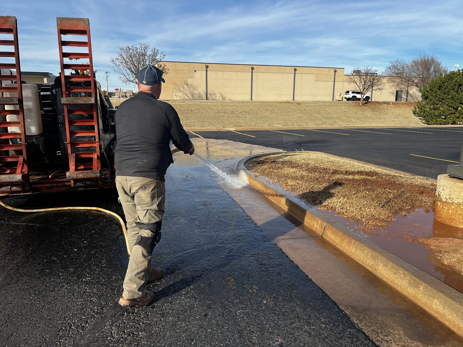 HDPE Pipe Reel Trailer Dallas HDD Contractors Directional drilling rig and crew on an open field utility bore