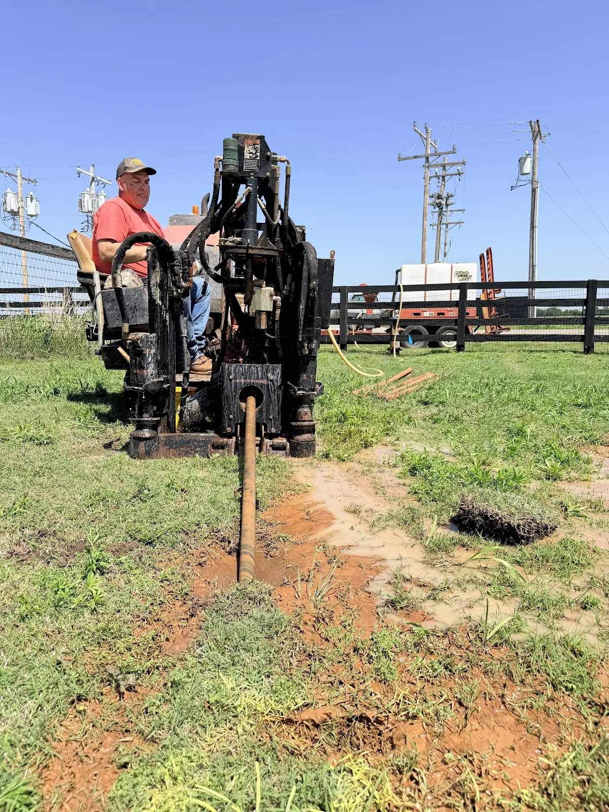 HDD Boring Equipment Open Field Dallas HDD Contractors Drill bit and locating equipment on a trenchless water line bore