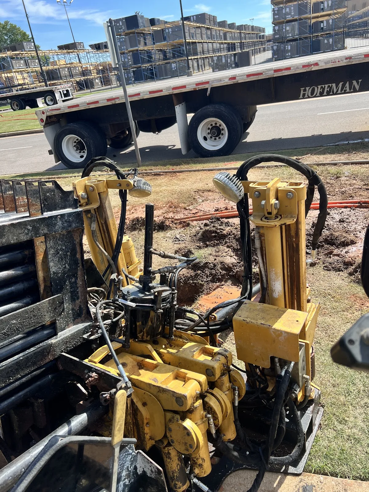 Directional drilling fleet and support equipment staged on a jobsite