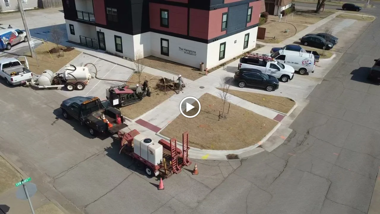 Aerial view of a directional boring operation showing the full work site