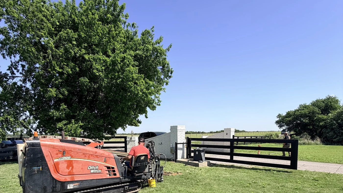 Ditch Witch HDD rig drilling a new utility line on a Dallas-area property